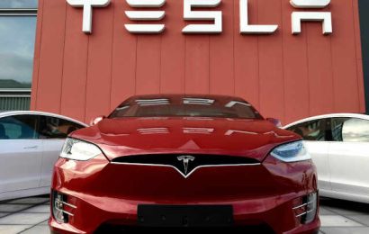 Tesla net income and earnings drop more than 20%
